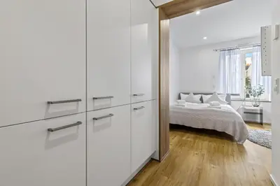 Ein Bett oder Betten in einem Zimmer der Unterkunft ma suite - Augsburg City