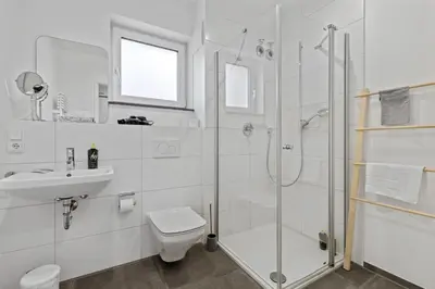 Ein Badezimmer in der Unterkunft ma suite - Augsburg City