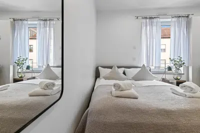 Ein Bett oder Betten in einem Zimmer der Unterkunft ma suite - Augsburg City
