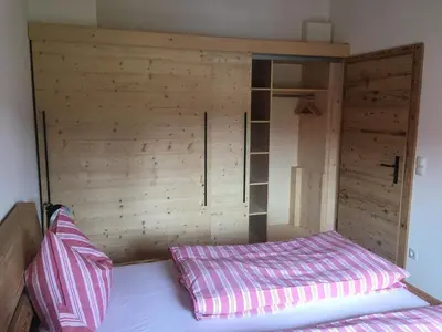 Ein Bett oder Betten in einem Zimmer der Unterkunft Ferienwohnung Sundratn