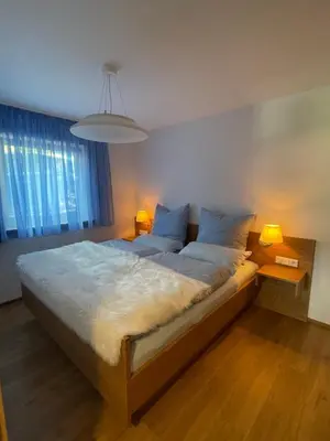 Ein Bett oder Betten in einem Zimmer der Unterkunft Landhaus Renata - Wendelstein