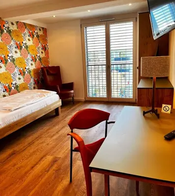 Ein Bett oder Betten in einem Zimmer der Unterkunft Wohnfakturei