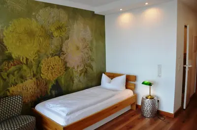 Ein Bett oder Betten in einem Zimmer der Unterkunft Wohnfakturei