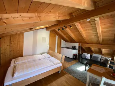 Ein Bett oder Betten in einem Zimmer der Unterkunft Traumferienwohnungen Schliersee