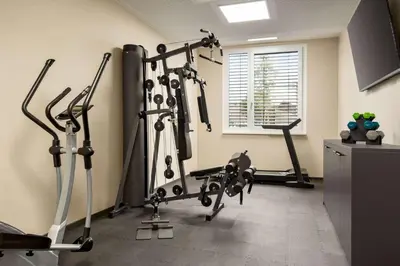 Das Fitnesscenter und/oder die Fitnesseinrichtungen in der Unterkunft Amedia Munich Dachau, Trademark Collection by Wyndham