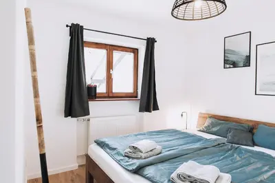 Ein Bett oder Betten in einem Zimmer der Unterkunft Mountain Mama Ferienhaus