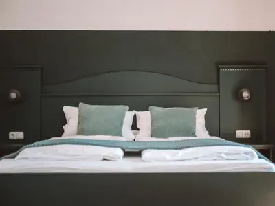 Ein Bett oder Betten in einem Zimmer der Unterkunft LEDA AM ECK