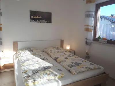 Ein Bett oder Betten in einem Zimmer der Unterkunft Ferienwohnungen Herbst