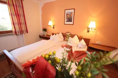 Ein Bett oder Betten in einem Zimmer der Unterkunft Klosterhof zur Post