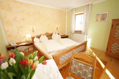 Ein Bett oder Betten in einem Zimmer der Unterkunft Klosterhof zur Post