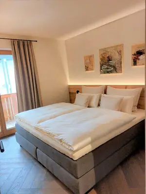 Ein Bett oder Betten in einem Zimmer der Unterkunft Ansitz Brenner