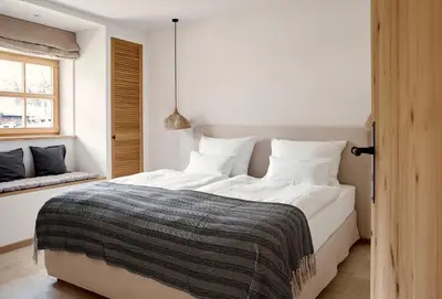 Ein Bett oder Betten in einem Zimmer der Unterkunft Der Schmiedhof