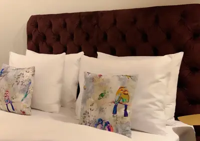 Ein Bett oder Betten in einem Zimmer der Unterkunft Maison Viktoria Augsburg