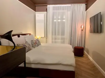 Ein Bett oder Betten in einem Zimmer der Unterkunft Maison Viktoria Augsburg