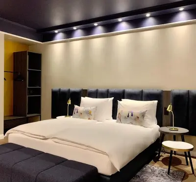 Ein Bett oder Betten in einem Zimmer der Unterkunft Maison Viktoria Augsburg