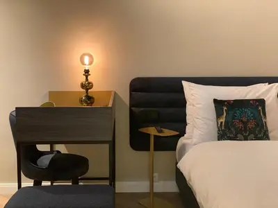 Ein Bett oder Betten in einem Zimmer der Unterkunft Maison Viktoria Augsburg