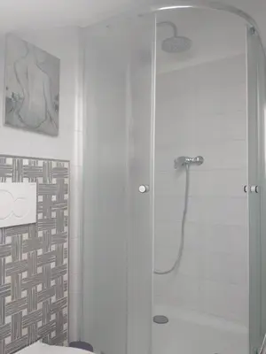 Ein Badezimmer in der Unterkunft Bad Aibling City Apartment DG