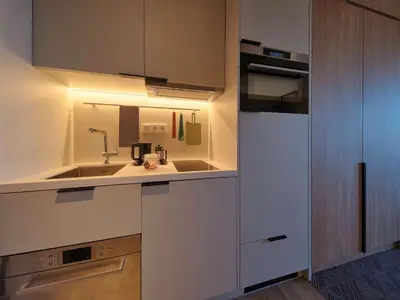 Küche/Küchenzeile in der Unterkunft Adina Apartment Hotel Munich