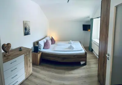 Ein Bett oder Betten in einem Zimmer der Unterkunft Süßes Studio mit Bergblick