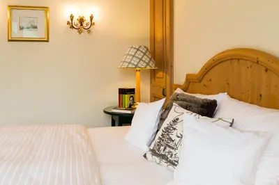 Ein Bett oder Betten in einem Zimmer der Unterkunft Boutique Hotel SEITNER HOF München Pullach