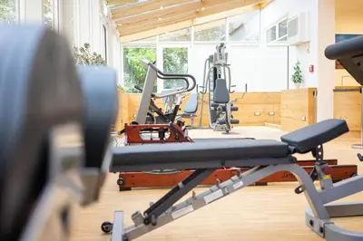 Das Fitnesscenter und/oder die Fitnesseinrichtungen in der Unterkunft Park Hotel Laim