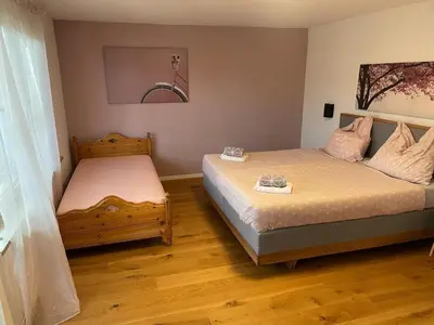 Ein Bett oder Betten in einem Zimmer der Unterkunft Ferienhaus Nähe Kochel am See