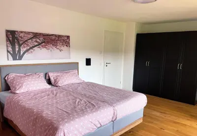 Ein Bett oder Betten in einem Zimmer der Unterkunft Ferienhaus Nähe Kochel am See