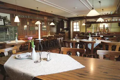 Ein Restaurant oder anderes Speiselokal in der Unterkunft Hotel Daimerwirt