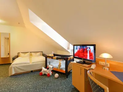 Ein Bett oder Betten in einem Zimmer der Unterkunft Hotel Jagermo