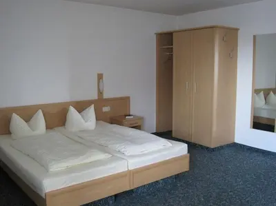 Ein Bett oder Betten in einem Zimmer der Unterkunft Hotel Jagermo