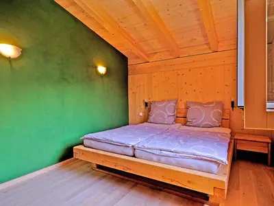 Ein Bett oder Betten in einem Zimmer der Unterkunft Ferienwohnung Schöpf