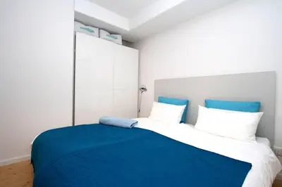 Ein Bett oder Betten in einem Zimmer der Unterkunft Modern & Friendly Apartment Ammersee