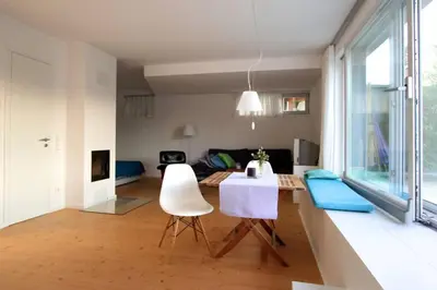 Ein Sitzbereich in der Unterkunft Modern & Friendly Apartment Ammersee
