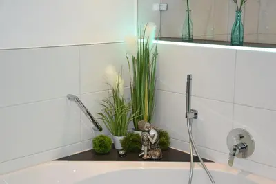 Ein Badezimmer in der Unterkunft Top-Moderne und geräumige Ferienwohnung