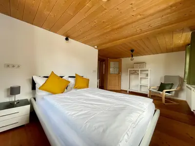 Ein Bett oder Betten in einem Zimmer der Unterkunft Bergien