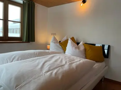 Ein Bett oder Betten in einem Zimmer der Unterkunft Bergien