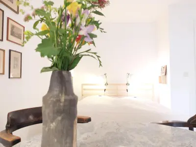 Ein Bett oder Betten in einem Zimmer der Unterkunft Ferienstudio-Apartment Tausendfreund 