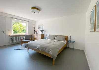 Ein Bett oder Betten in einem Zimmer der Unterkunft Stilvolles Apartment mit Bergblick-Hütte und Garten