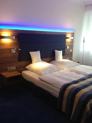 Ein Bett oder Betten in einem Zimmer der Unterkunft Hotel Da Vinci