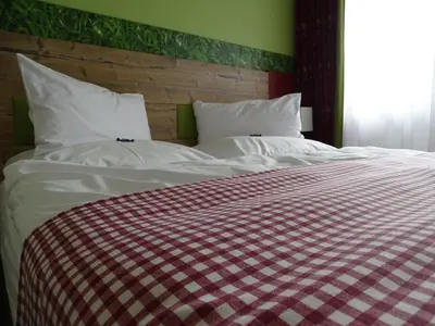 Ein Bett oder Betten in einem Zimmer der Unterkunft Hotel Da Vinci