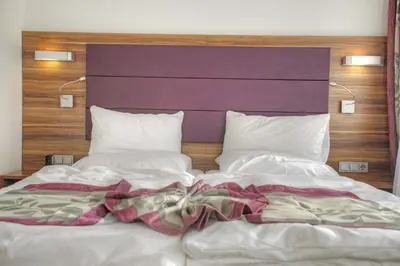 Ein Bett oder Betten in einem Zimmer der Unterkunft Hotel Da Vinci
