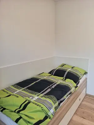 Ein Bett oder Betten in einem Zimmer der Unterkunft Modern flat, WIFI, central, calm, clean