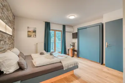 Ein Bett oder Betten in einem Zimmer der Unterkunft Ferienwohnung Wilder Kaiser