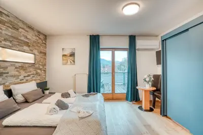 Ein Bett oder Betten in einem Zimmer der Unterkunft Ferienwohnung Wilder Kaiser