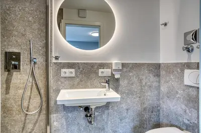 Ein Badezimmer in der Unterkunft Urlaub im Inntal Apartmenthaus Kiefersfelden