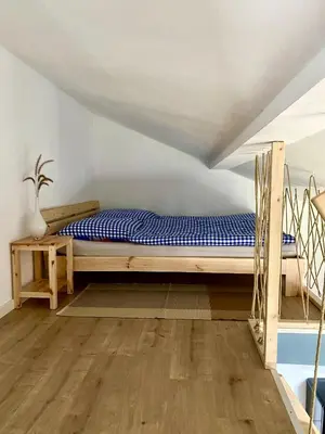 Ein Bett oder Betten in einem Zimmer der Unterkunft Galerie Apartment Self-Check-In