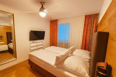 Ein Bett oder Betten in einem Zimmer der Unterkunft Villa Viktoria 2 - Apartments