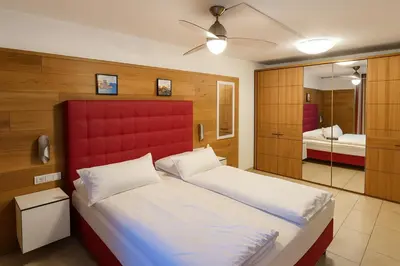 Ein Bett oder Betten in einem Zimmer der Unterkunft Villa Viktoria 2 - Apartments