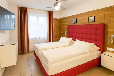 Ein Bett oder Betten in einem Zimmer der Unterkunft Villa Viktoria 2 - Apartments