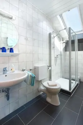 Ein Badezimmer in der Unterkunft Haus Sabine